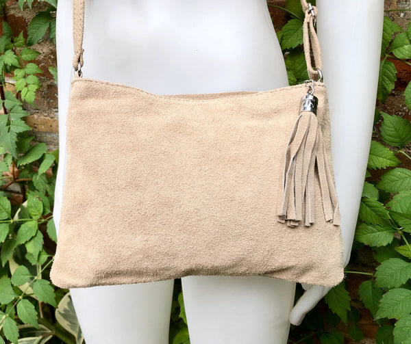 Light beige suede leather bag. GENUINE leather small crossbody / shoulder bag.Adjustable strap + zipper. Cream suede purse with tassel.