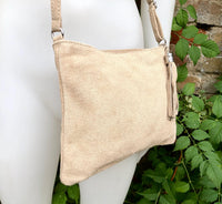 Light beige suede leather bag. GENUINE leather small crossbody / shoulder bag.Adjustable strap + zipper. Cream suede purse with tassel.