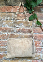 Light beige suede leather bag. GENUINE leather small crossbody / shoulder bag.Adjustable strap + zipper. Cream suede purse with tassel.