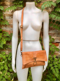 Small cross body bag in camel brown “distressed” vintage style genuine leather. Enveloppe bag with adjustable strap and flap. Boho purse