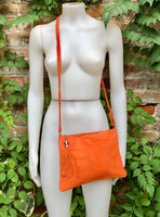 Orange suede leather bag. GENUINE leather small crossbody / shoulder bag.Adjustable strap + zipper. Orange suede purse with tassel.