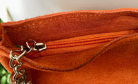 Orange suede leather bag. GENUINE leather small crossbody / shoulder bag.Adjustable strap + zipper. Orange suede purse with tassel.