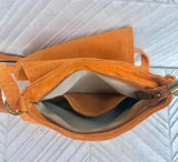 Orange suede bag. Small crossbody /shoulder genuine leather purse. Rounded orange boho messenger bag with flap, zipper + tassel. Hippy purse