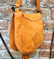 Orange suede bag. Small crossbody /shoulder genuine leather purse. Rounded orange boho messenger bag with flap, zipper + tassel. Hippy purse