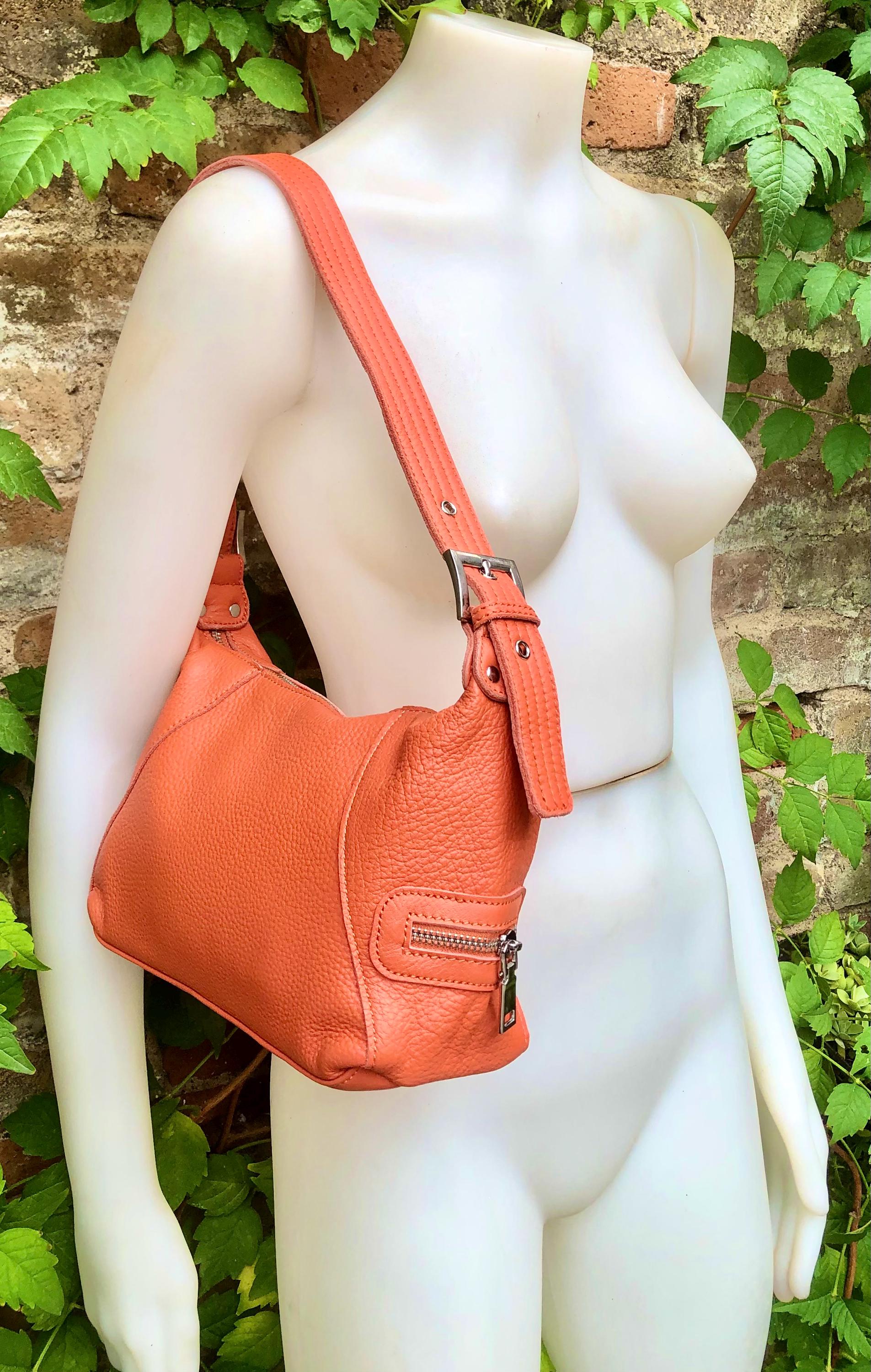 ORANGE genuine leather bag. Cross body / shoulder pumkin color leather purse, 2 adjustable straps, longer + shorter. Closed with a zipper.