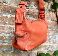 Small ORANGE genuine leather bag. Orange cross body / shoulder bag. Pumkin color leather purse, 2 adjustable straps, closed with a zipper.