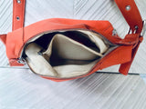 ORANGE genuine leather bag. Cross body / shoulder pumkin color leather purse, 2 adjustable straps, longer + shorter. Closed with a zipper.