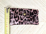 Cheetah print coin purse in genuine metallic leather with 3 pockets, zipper + flap. Fits credit cards, coins, bills. Leopard print wallet.