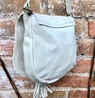 Cream suede bag. Small crossbody /shoulder genuine leather purse. Broken white boho messenger bag. Flap, zipper + tassel. Cream hippy purse