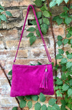 FUCHSIA suede leather bag. GENUINE leather small crossbody / shoulder bag.Adjustable strap + zipper. Hot pink suede purse with tassel.