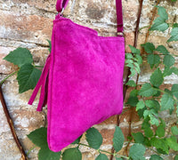 FUCHSIA suede leather bag. GENUINE leather small crossbody / shoulder bag.Adjustable strap + zipper. Hot pink suede purse with tassel.