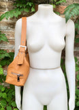 Small camel brown genuine leather bag. Light brown cross body / shoulder bag. Tan leather purse, 2 adjustable straps, closed with a zipper.