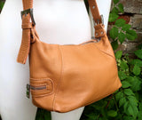 Small camel brown genuine leather bag. Light brown cross body / shoulder bag. Tan leather purse, 2 adjustable straps, closed with a zipper.