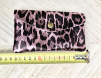 Cheetah print coin purse in genuine metallic leather with 3 pockets, zipper + flap. Fits credit cards, coins, bills. Leopard print wallet.