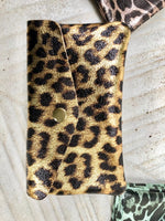 Cheetah print coin purse in genuine metallic leather with 3 pockets, zipper + flap. Fits credit cards, coins, bills. Leopard print wallet.