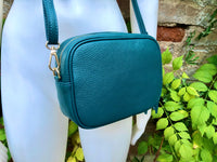 Small leather bag in TEAL blue-green. Cross body / shoulder bag in GENUINE leather. Dark blue purse. Tassel on the zipper . Gold accents.