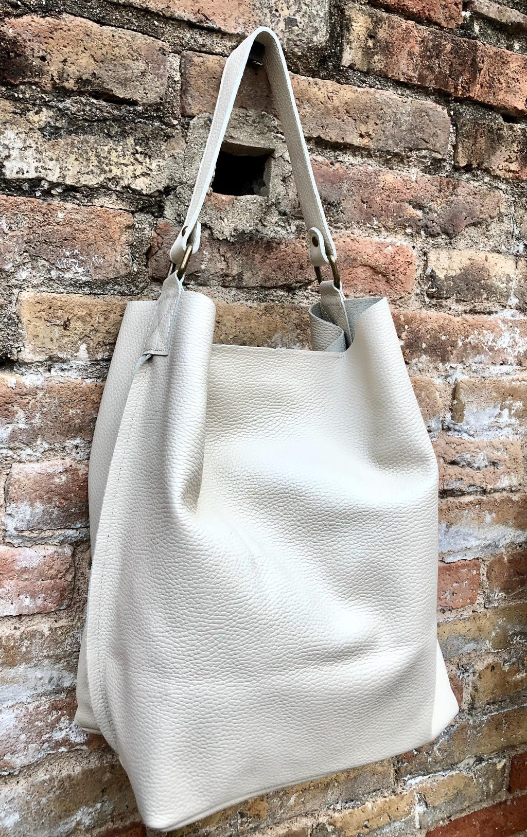 Slouch leather shopper bag in creamy white. Very light beige hobo shoulder bag. Genuine leather book / tablet bag. Cream leather purse