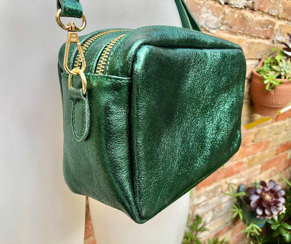 Small leather bag in metallic green. Genuine leather cross body / shoulder bag. Dark green glitter purse. Adjustable strap. Gold accents