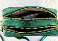 Small leather bag in metallic green. Genuine leather cross body / shoulder bag. Dark green glitter purse. Adjustable strap. Gold accents