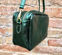 Small leather bag in metallic green. Genuine leather cross body / shoulder bag. Dark green glitter purse. Adjustable strap. Gold accents