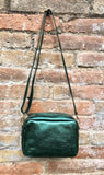 Small leather bag in metallic green. Genuine leather cross body / shoulder bag. Dark green glitter purse. Adjustable strap. Gold accents