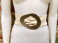 Cream white suede waist belt with large metal buckle in gold. Soft suede belt in very light beige. Boho cream dress belt with golden buckle.