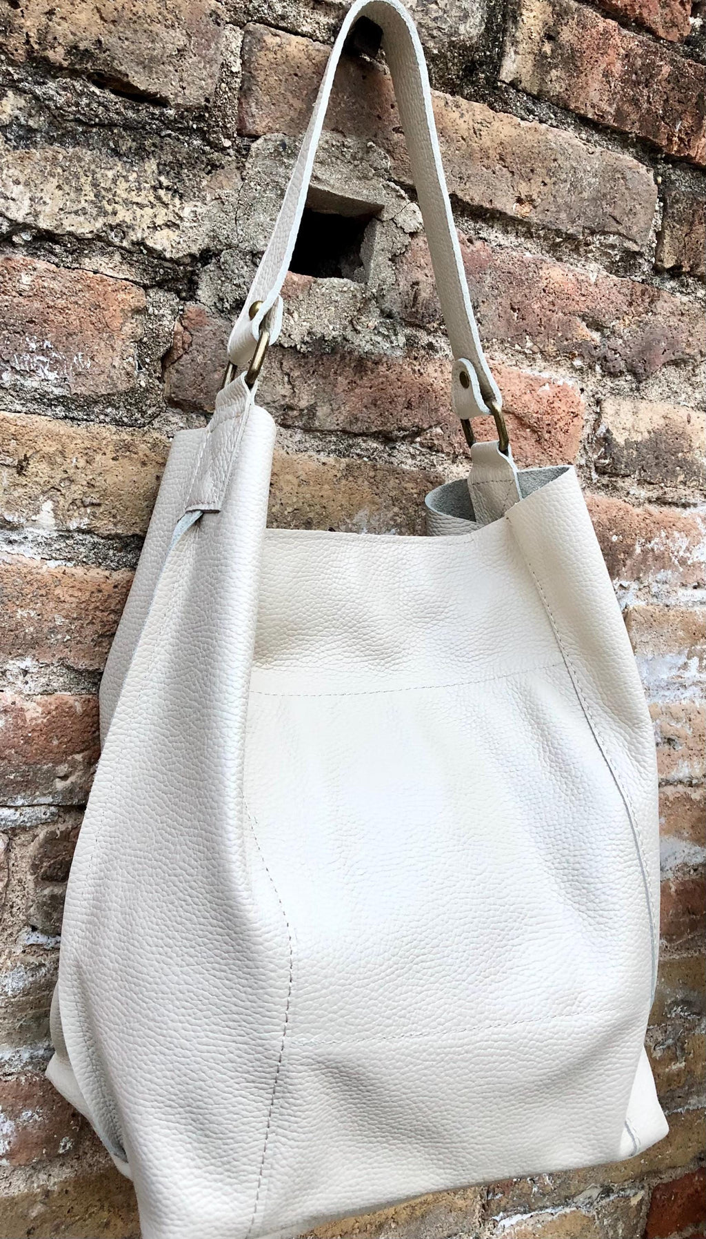 Slouch leather shopper bag in creamy white. Very light beige hobo shoulder bag. Genuine leather book / tablet bag. Cream leather purse