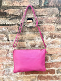 Small leather bag in Fuchsia pink. Cross body, shoulder bag or wristlet in GENUINE leather. Pink purse with adjustable strap. Soft leather.