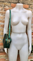 Small leather bag in metallic green. Genuine leather cross body / shoulder bag. Dark green glitter purse. Adjustable strap. Gold accents