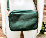 Small leather bag in metallic green. Genuine leather cross body / shoulder bag. Dark green glitter purse. Adjustable strap. Gold accents