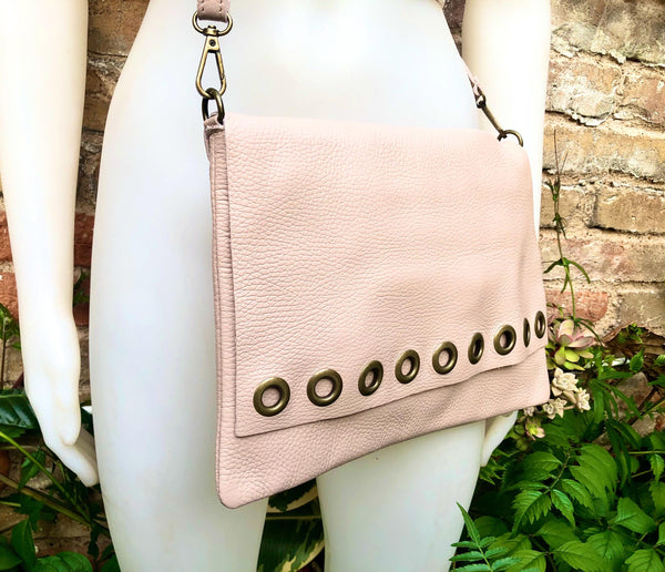 Light pink genuine leather crossbody / shoulder bag. Pink messenger. Zipper, flap + adjustable strap. Pink leather purse with bronze tacks