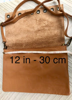 Light pink genuine leather crossbody / shoulder bag. Pink messenger. Zipper, flap + adjustable strap. Pink leather purse with bronze tacks