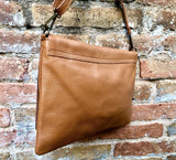 Camel brown genuine leather crossbody / shoulder bag. Rusty brown messenger bag. Zipper, flap + adjustable strap. Tan brown leather purse