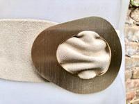 Cream white suede waist belt with large metal buckle in gold. Soft suede belt in very light beige. Boho cream dress belt with golden buckle.