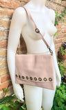 Light pink genuine leather crossbody / shoulder bag. Pink messenger. Zipper, flap + adjustable strap. Pink leather purse with bronze tacks
