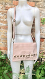 Light pink genuine leather crossbody / shoulder bag. Pink messenger. Zipper, flap + adjustable strap. Pink leather purse with bronze tacks
