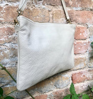 Small leather bag in CREAM WHITE. Crossbody / shoulder bag/ wristlet in GENUINE leather. Adjustable strap and zipper. Broken white purse.