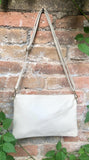 Small leather bag in CREAM WHITE. Crossbody / shoulder bag/ wristlet in GENUINE leather. Adjustable strap and zipper. Broken white purse.
