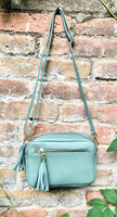 Small sage green leather bag. GENUINE leather shoulder / cross body bag. Light green leather purse with tassels, adjustable strap and zipper