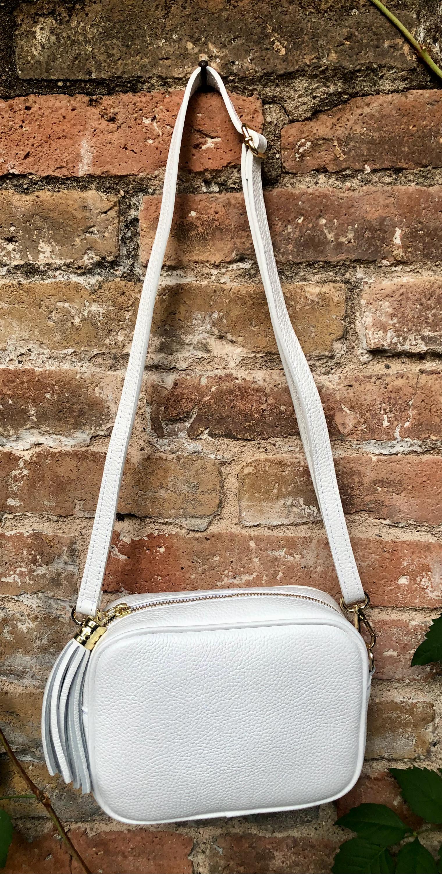 Small leather bag in white. Crossbody / shoulder bag in white GENUINE leather. Adjustable strap, zipper. White leather purse with tassel.