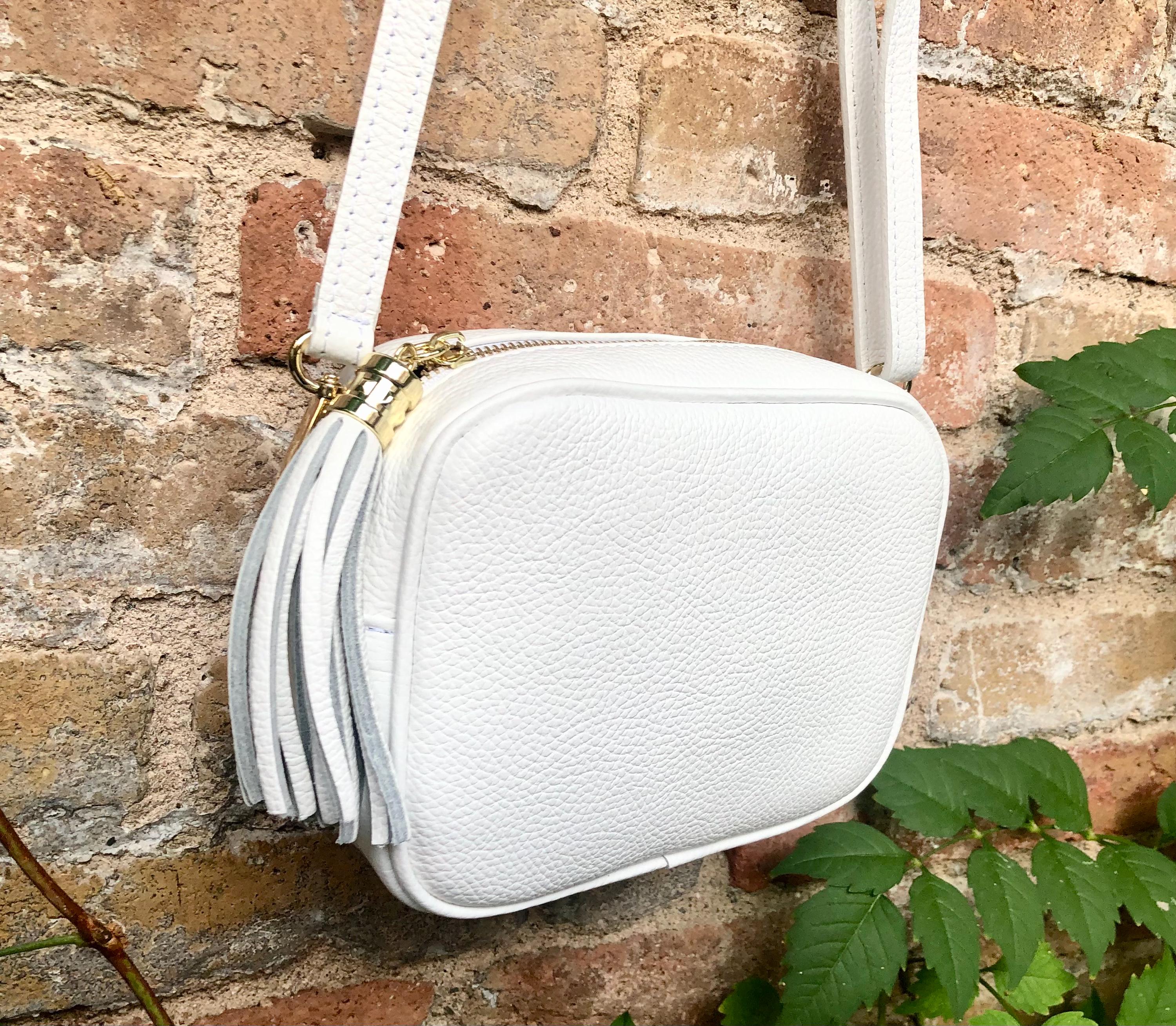 Small leather bag in white. Crossbody / shoulder bag in white GENUINE leather. Adjustable strap, zipper. White leather purse with tassel.