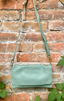 Small leather bag in sage green. GENUINE leather cross body / shoulder bag in light green leather bag with adjustable strap, zipper and flap