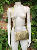 Small leather bag in GOLD. Cross body bag, shoulder bag in GENUINE leather. Metallic shine bag with adjustable strap, zipper and flap.