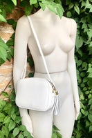 Small leather bag in white. Crossbody / shoulder bag in white GENUINE leather. Adjustable strap, zipper. White leather purse with tassel.