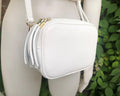 Small leather bag in white. Crossbody / shoulder bag in white GENUINE leather. Adjustable strap, zipper. White leather purse with tassel.