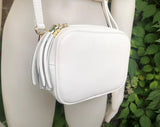 Small leather bag in white. Crossbody / shoulder bag in white GENUINE leather. Adjustable strap, zipper. White leather purse with tassel.