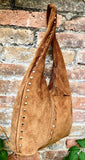 Slouch bag in CAMEL brown with bronze tacks and zipper. Genuine leather bag. Light tobacco color lined bag. Medium brown suede purse.
