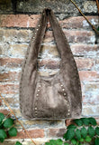 Slouch bag in TAUPE brown with bronze tacks and zipper. Genuine leather bag. Light BROWN color lined bag. Greyge brown suede purse.