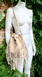 Crossbody / shoulder fringed bag. Beige BOHO suede leather drawstring bag with long FRINGES. Genuine leather hippy bag. Suede fringed purse.