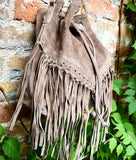 Crossbody / shoulder hippy fringed bag. Light brown BOHO suede leather drawstring bag. Long FRINGES. Light brown genuine suede leather purse